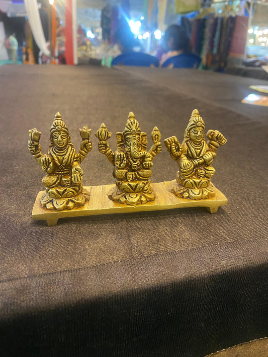 Brass Lakshmi, Ganesha, Saraswati Idol Set – Intricately Crafted Brass Statues on Wooden Base for Home Decor and Pooja